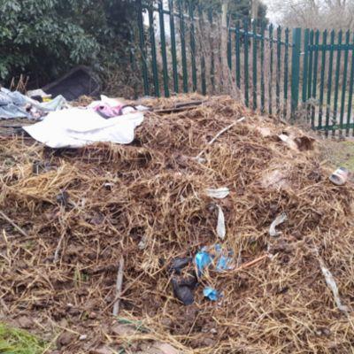 Pile of waste outdoors, fly tipped